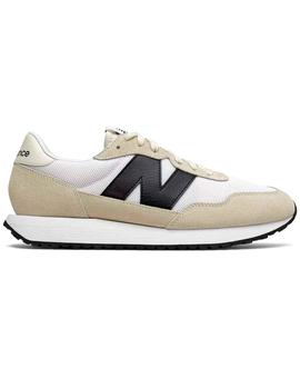 new balance blancas suela marron